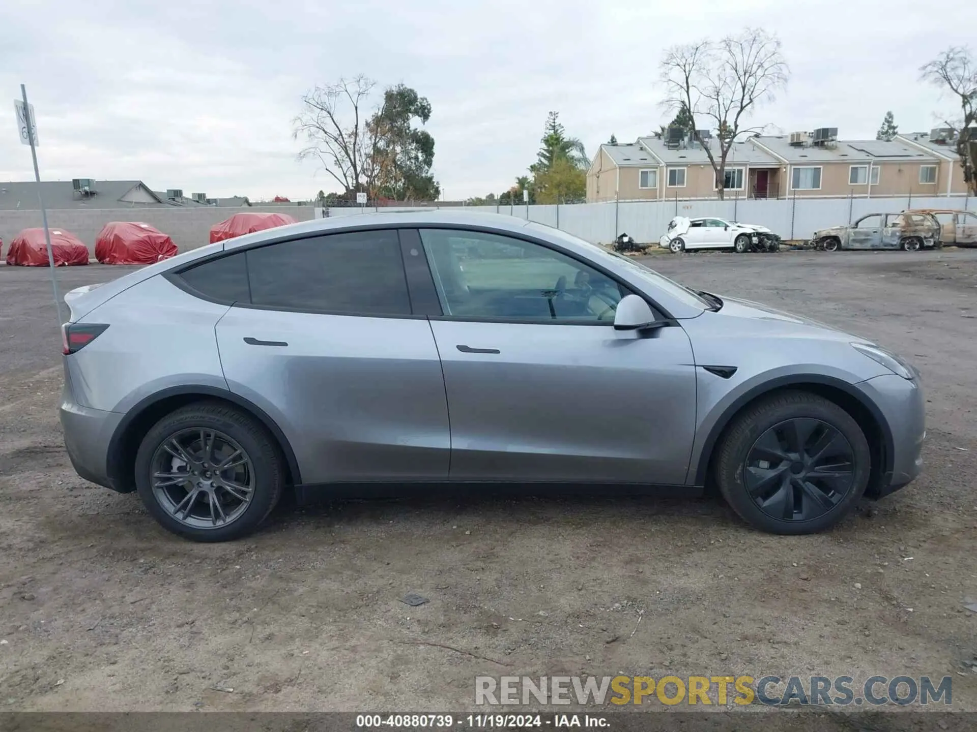 14 Photograph of a damaged car 7SAYGDEE1RA312143 TESLA MODEL Y 2024
