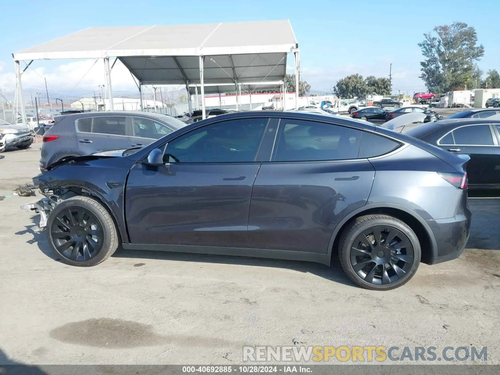 15 Photograph of a damaged car 7SAYGDEE1RF006014 TESLA MODEL Y 2024
