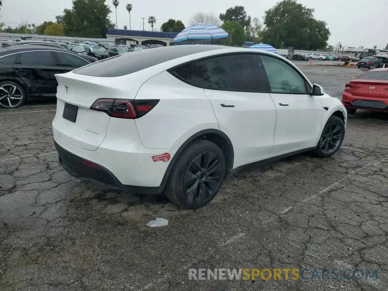 3 Photograph of a damaged car 7SAYGDEE1RF124192 TESLA MODEL Y 2024