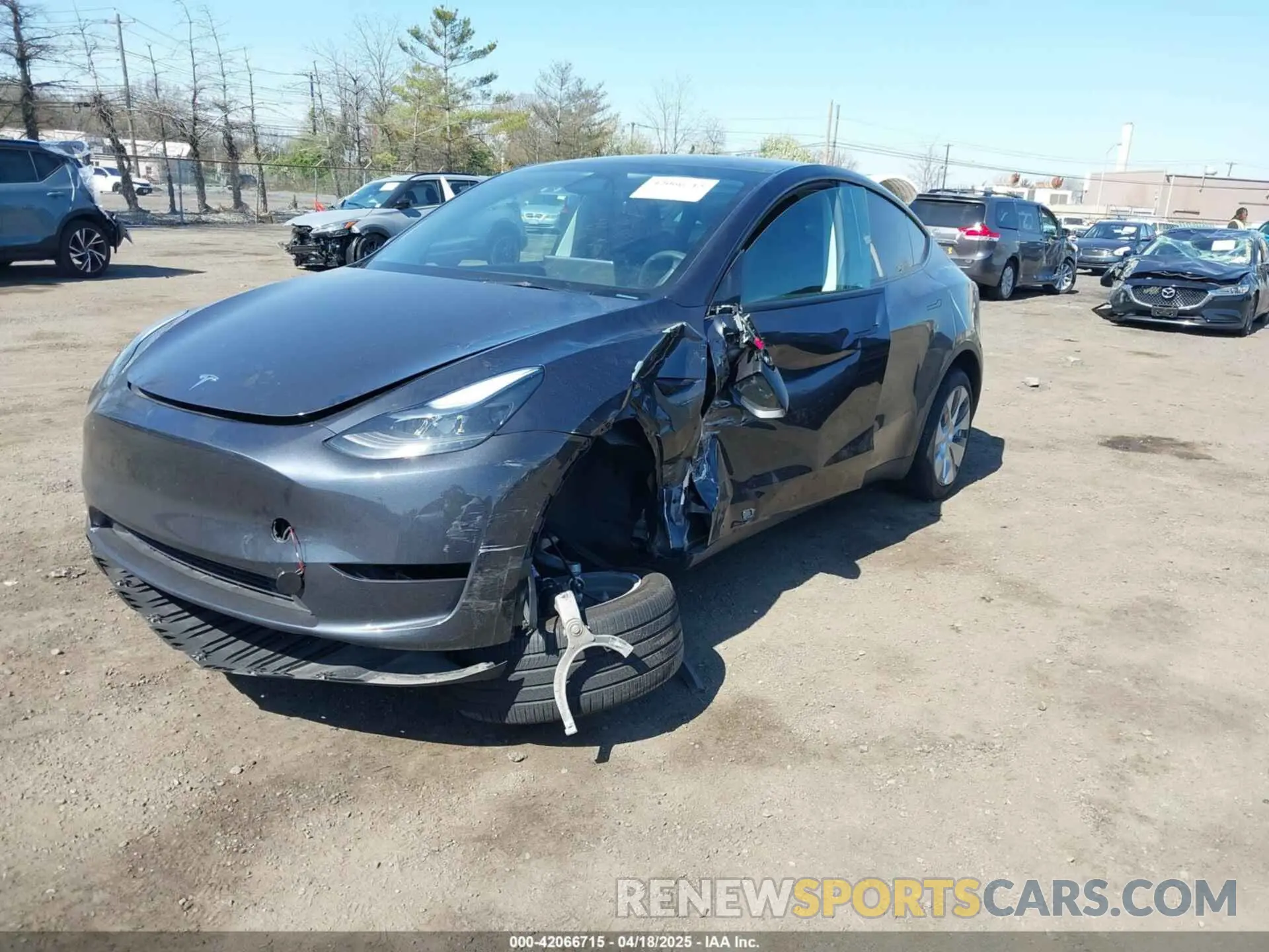 2 Photograph of a damaged car 7SAYGDEE2RA281016 TESLA MODEL Y 2024
