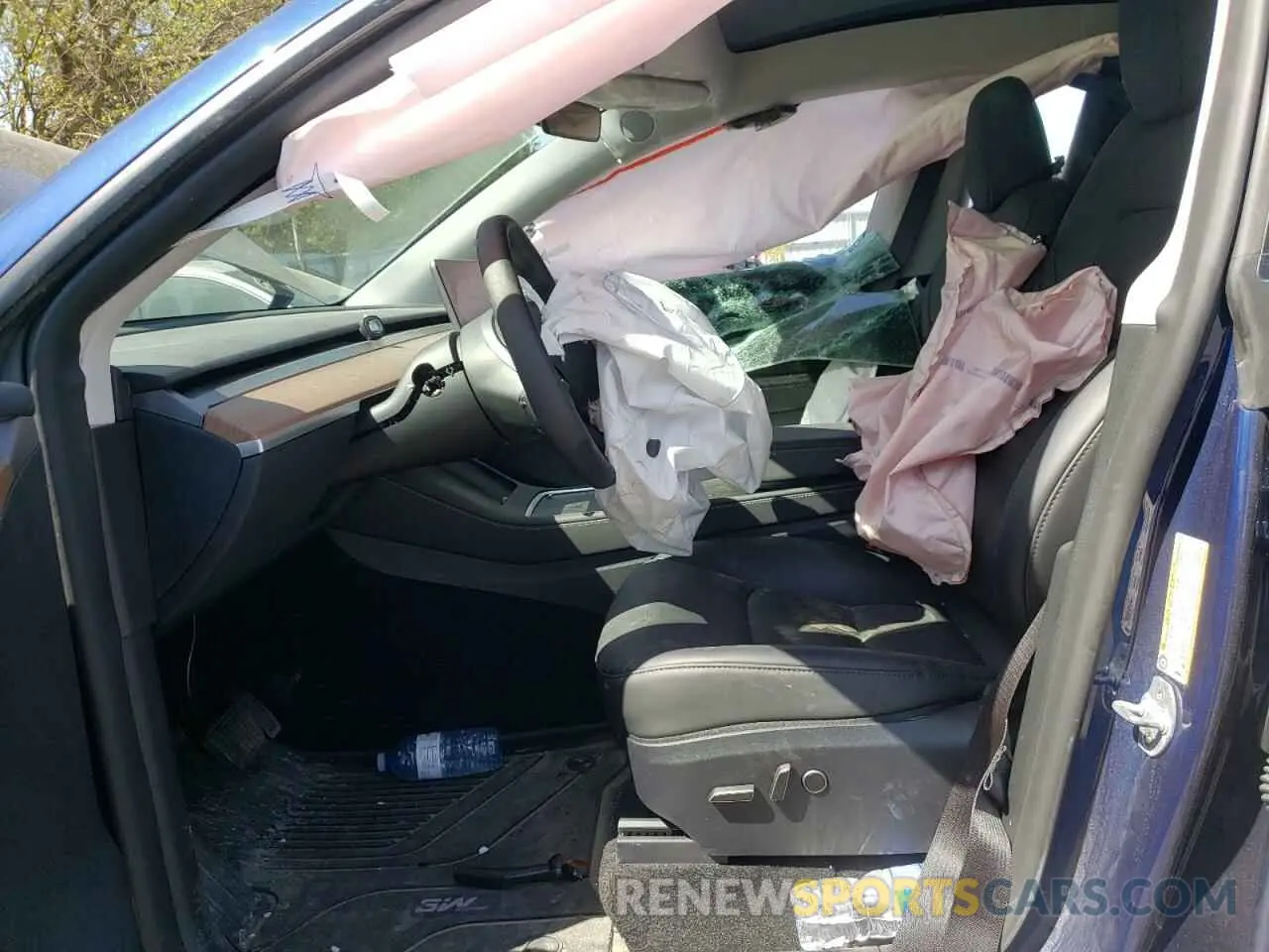 7 Photograph of a damaged car 7SAYGDEE2RF083216 TESLA MODEL Y 2024