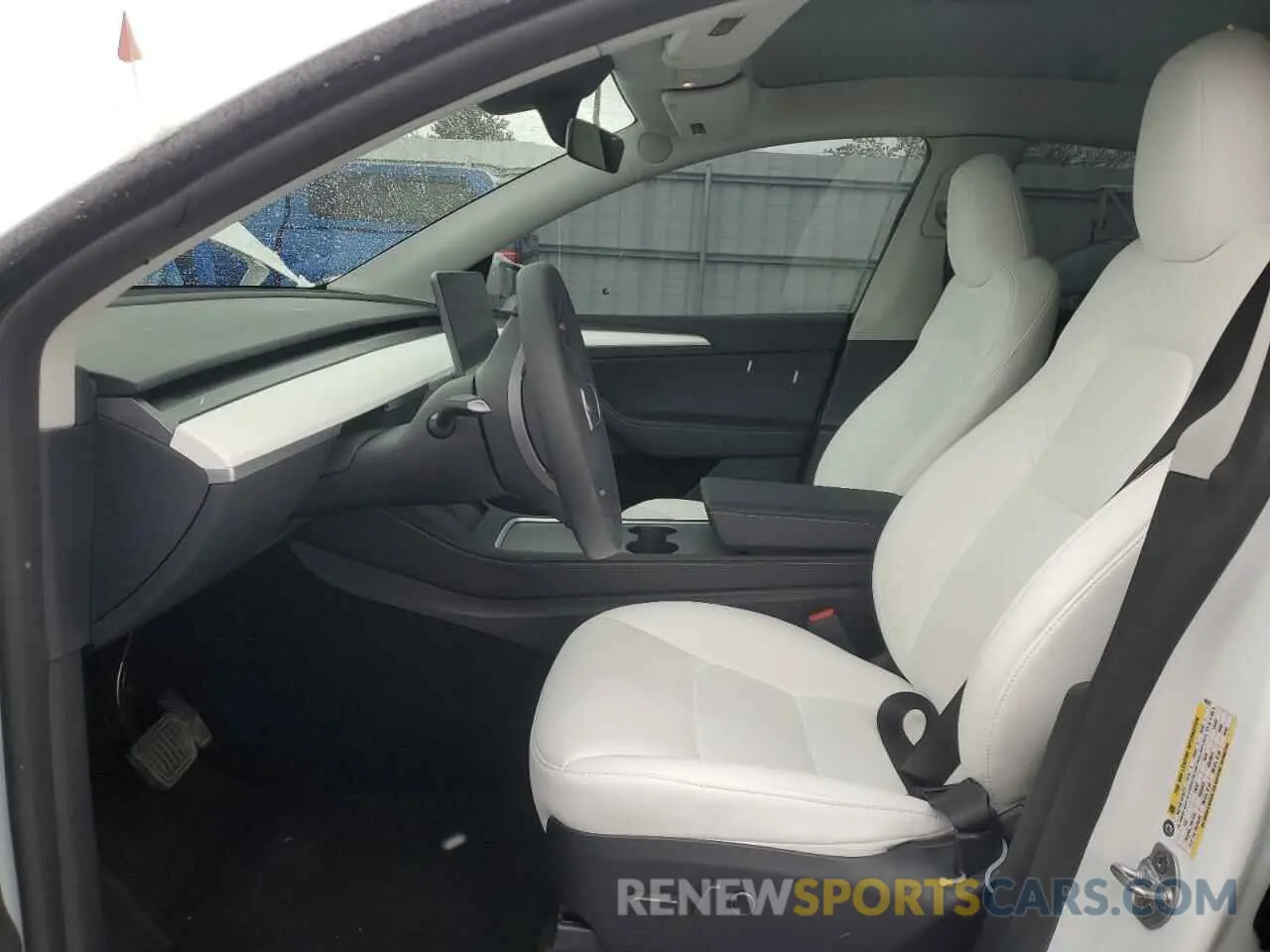 7 Photograph of a damaged car 7SAYGDEE2RF160327 TESLA MODEL Y 2024