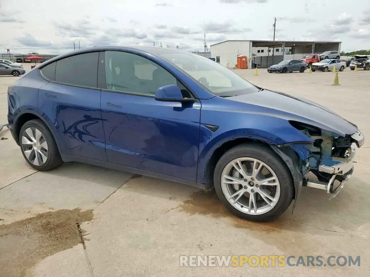 4 Photograph of a damaged car 7SAYGDEE2RF986014 TESLA MODEL Y 2024
