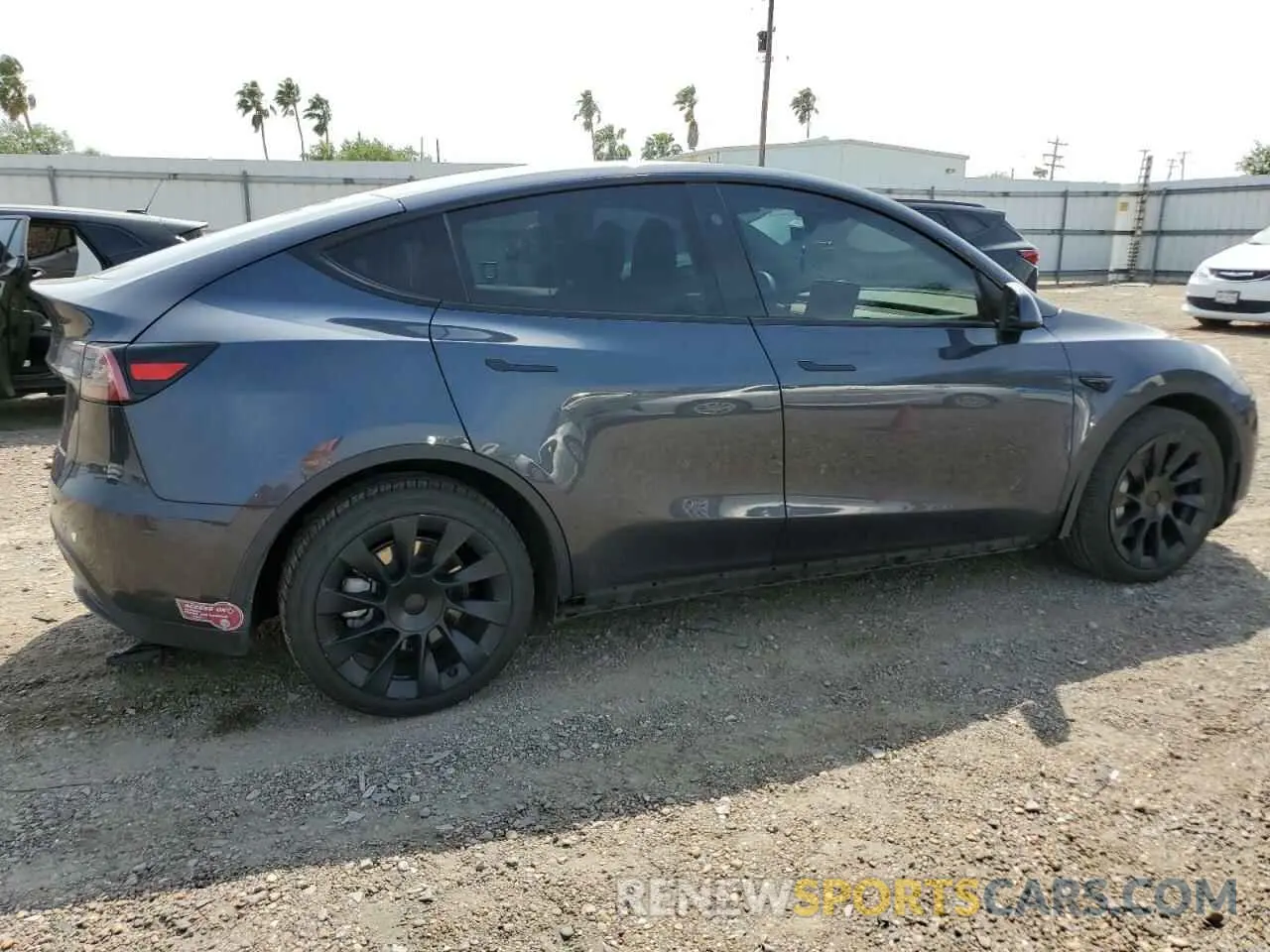 3 Photograph of a damaged car 7SAYGDEE3RA234223 TESLA MODEL Y 2024