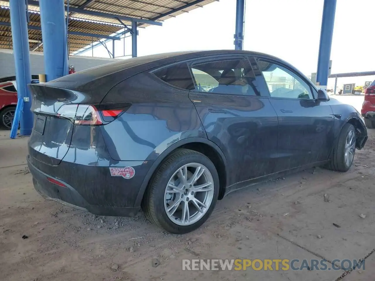 3 Photograph of a damaged car 7SAYGDEE3RA235002 TESLA MODEL Y 2024