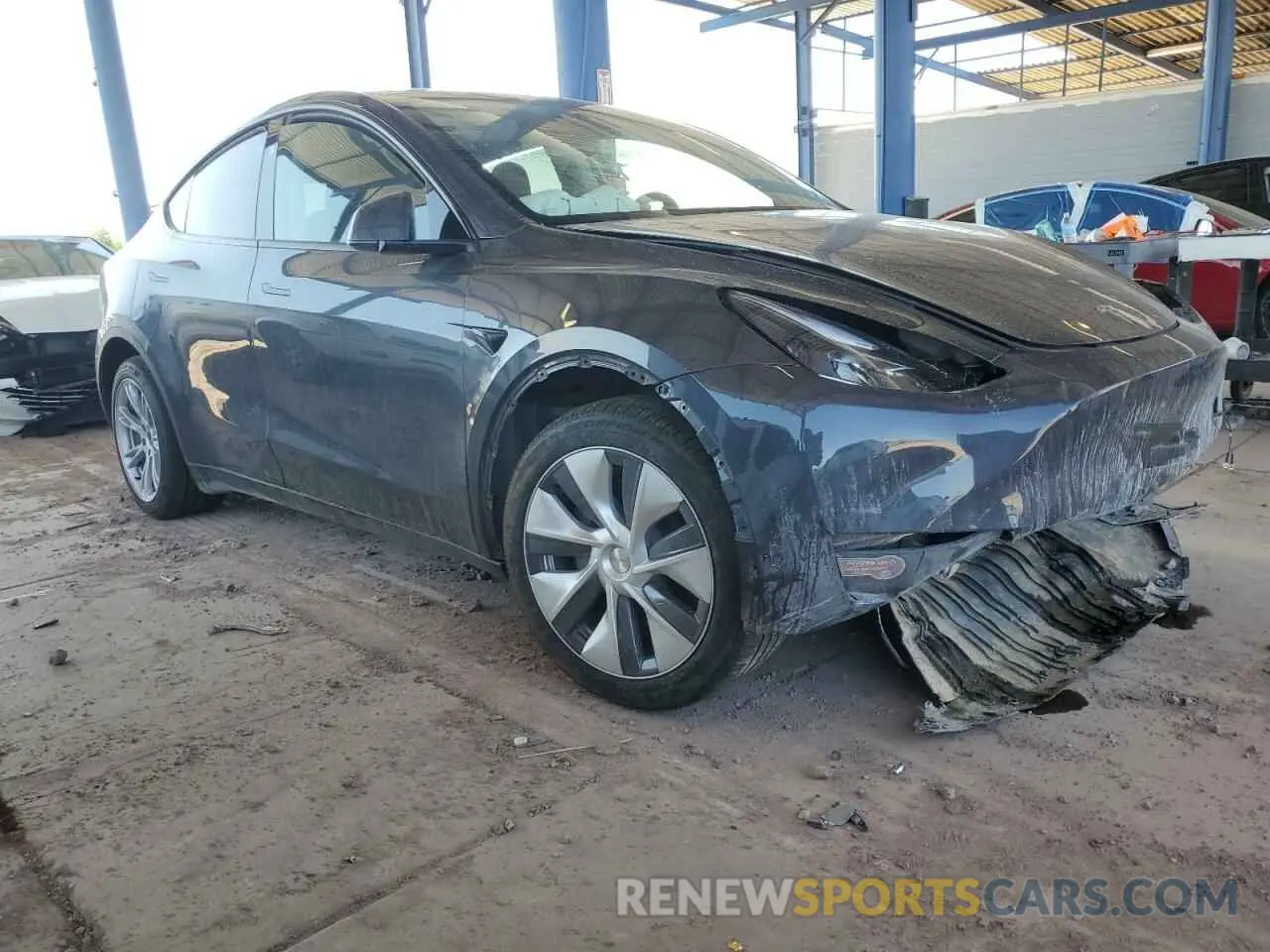 4 Photograph of a damaged car 7SAYGDEE3RA235002 TESLA MODEL Y 2024