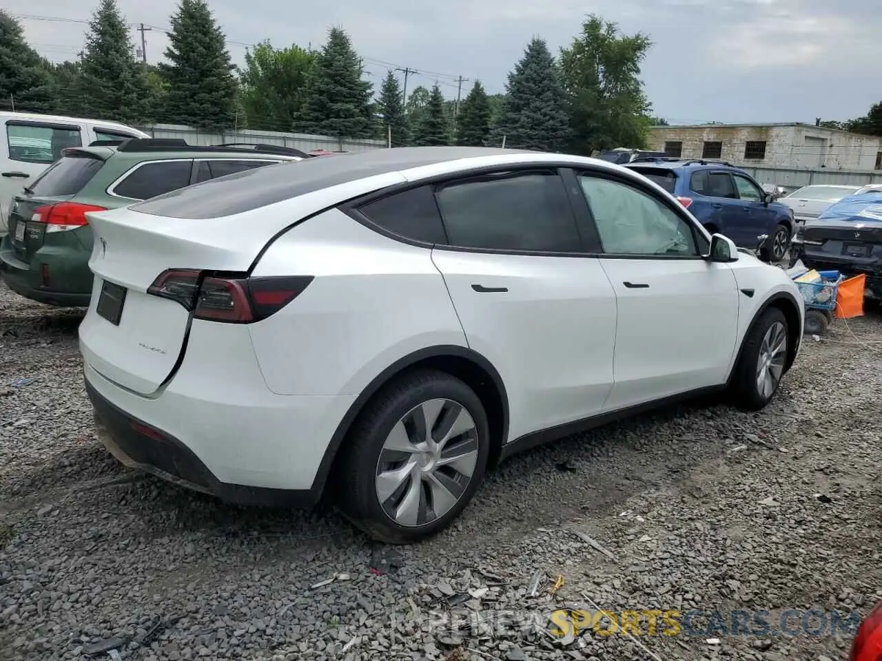 3 Photograph of a damaged car 7SAYGDEE3RA262264 TESLA MODEL Y 2024