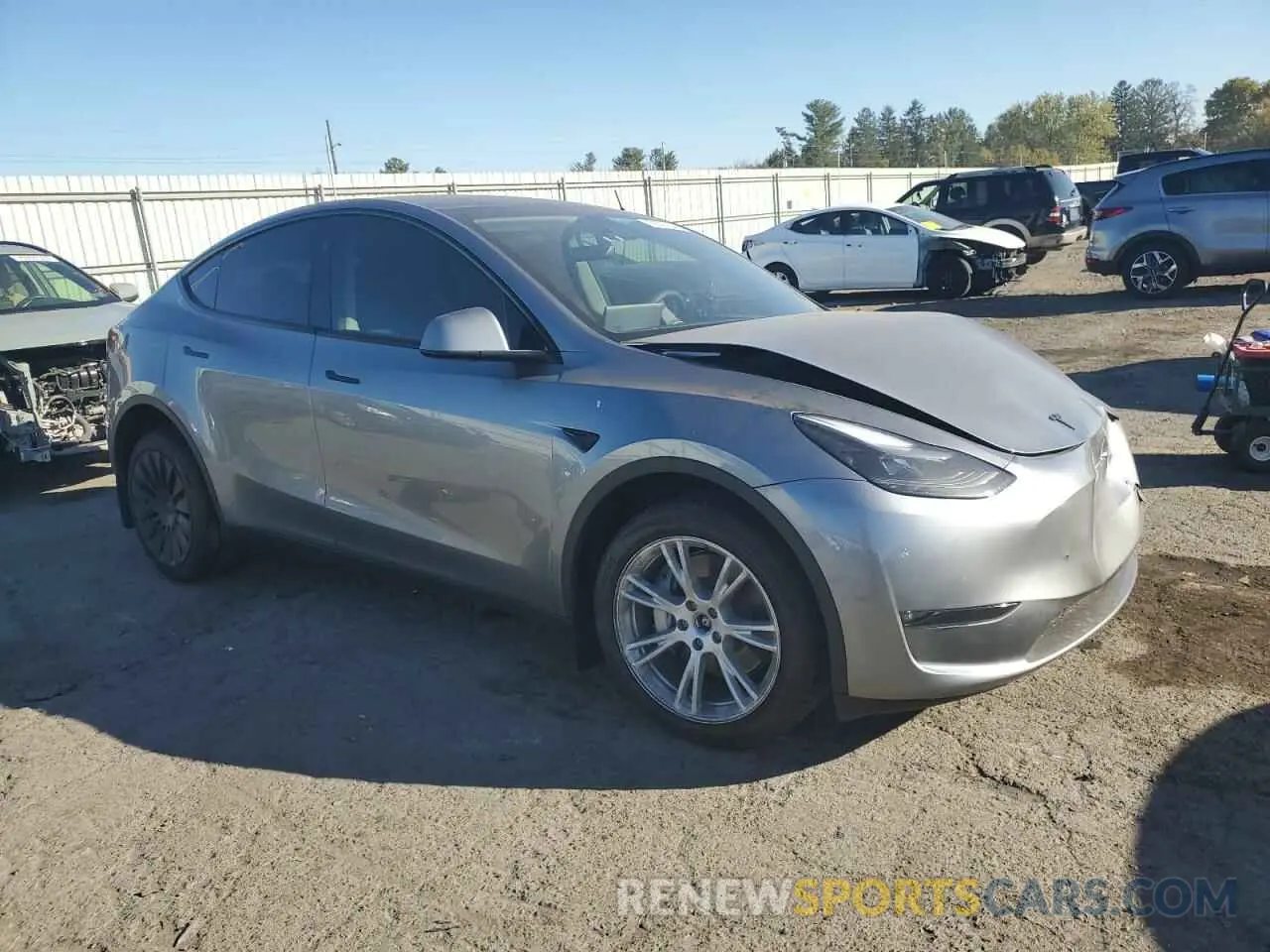 4 Photograph of a damaged car 7SAYGDEE3RA279131 TESLA MODEL Y 2024