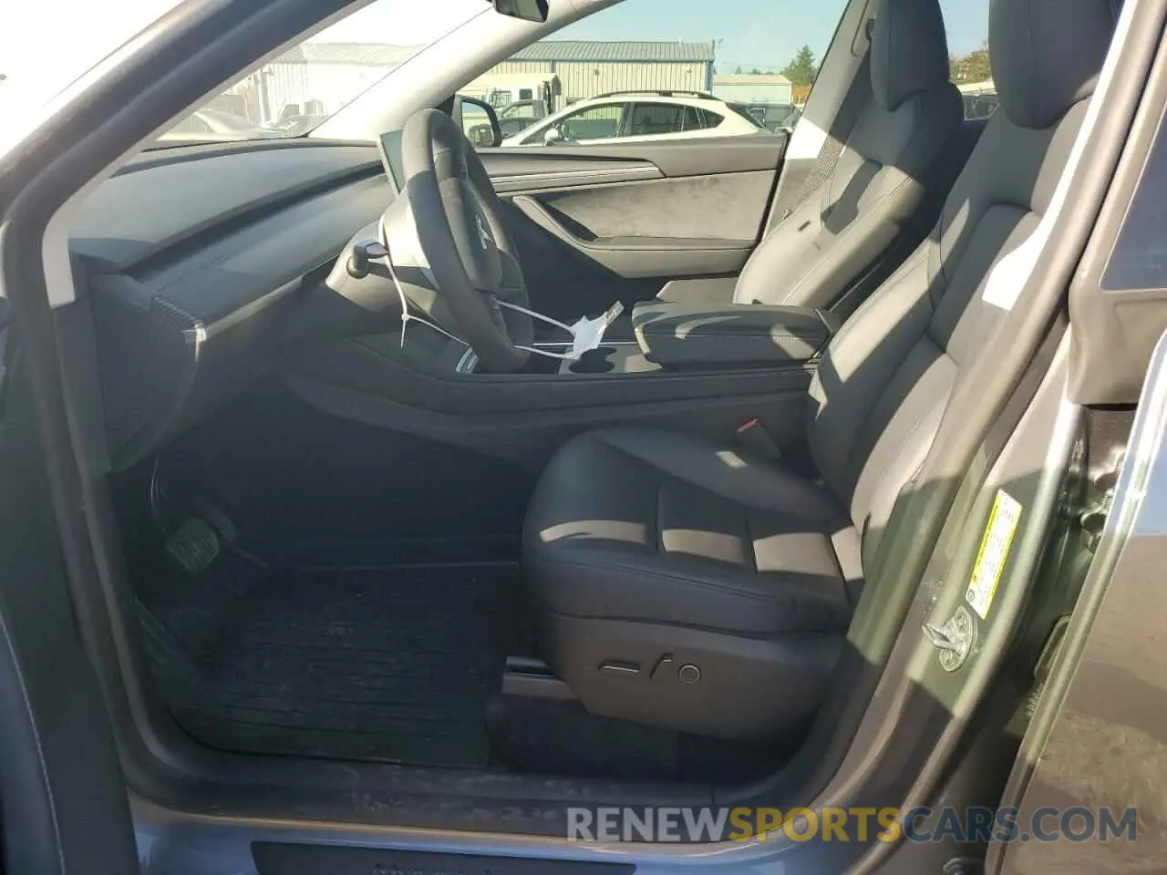 7 Photograph of a damaged car 7SAYGDEE3RA279131 TESLA MODEL Y 2024