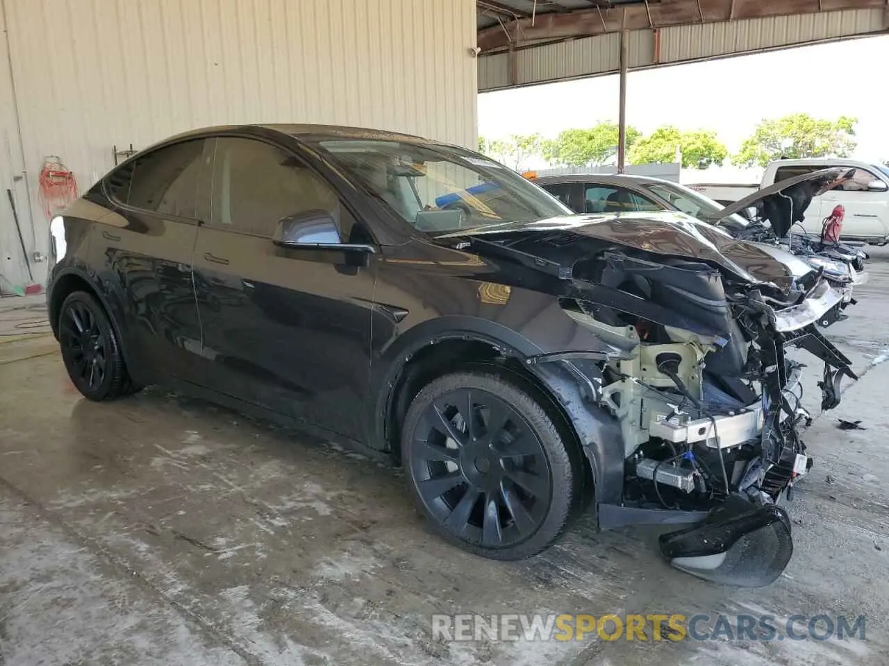 4 Photograph of a damaged car 7SAYGDEE3RA280814 TESLA MODEL Y 2024