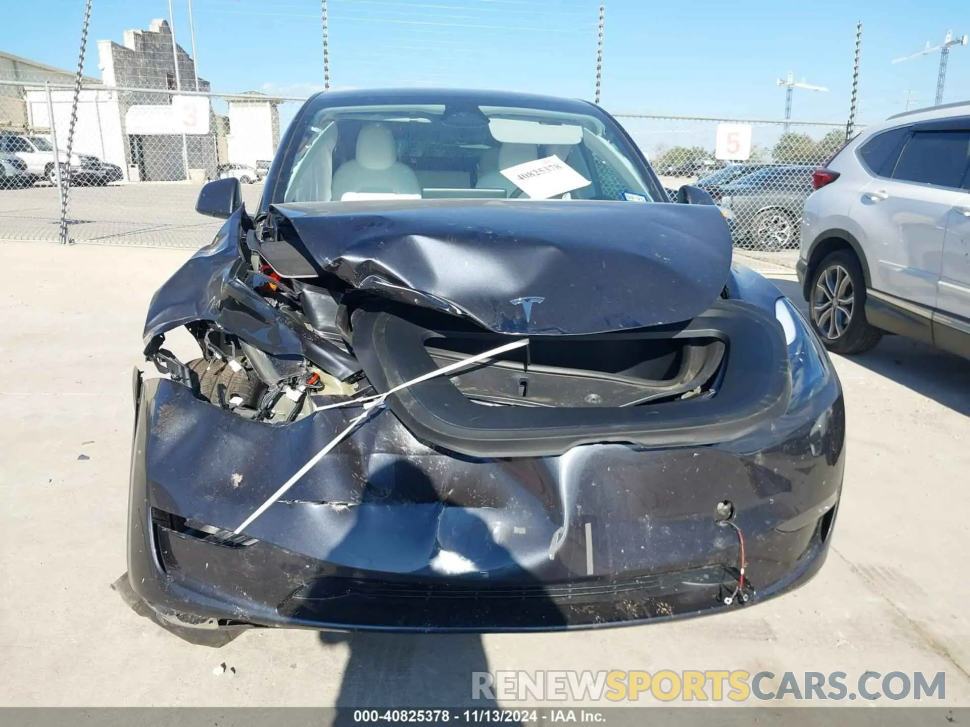 12 Photograph of a damaged car 7SAYGDEE3RA321734 TESLA MODEL Y 2024