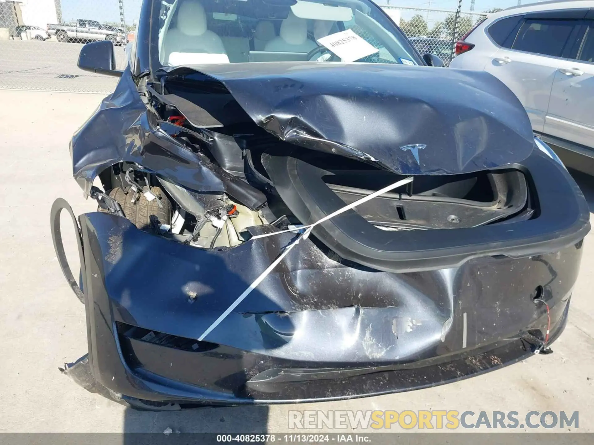 6 Photograph of a damaged car 7SAYGDEE3RA321734 TESLA MODEL Y 2024