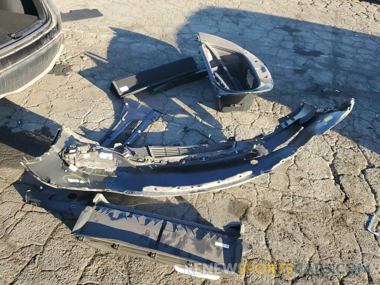 12 Photograph of a damaged car 7SAYGDEE3RF008119 TESLA MODEL Y 2024