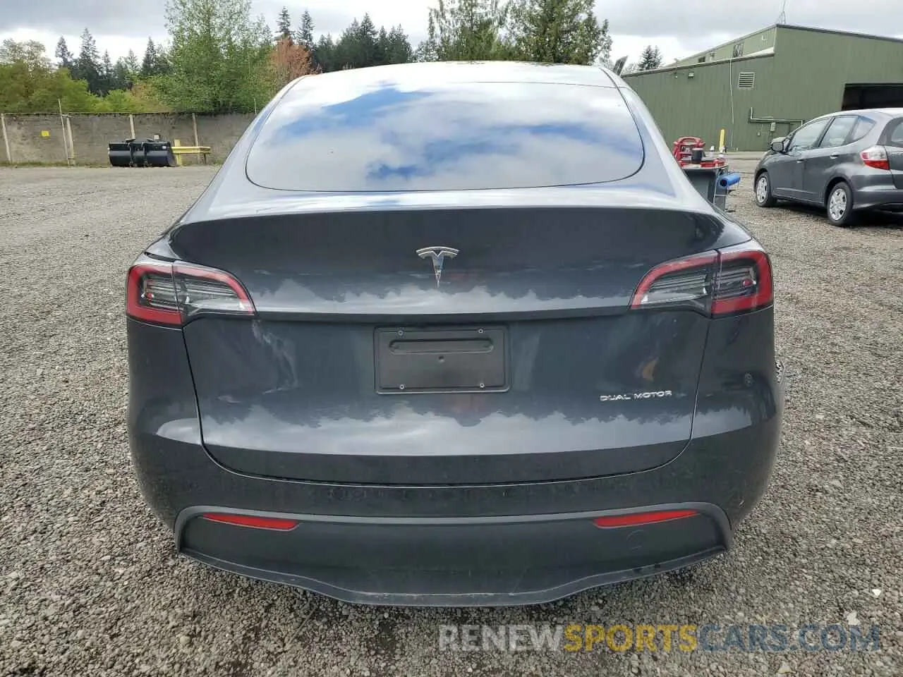 6 Photograph of a damaged car 7SAYGDEE3RF072919 TESLA MODEL Y 2024