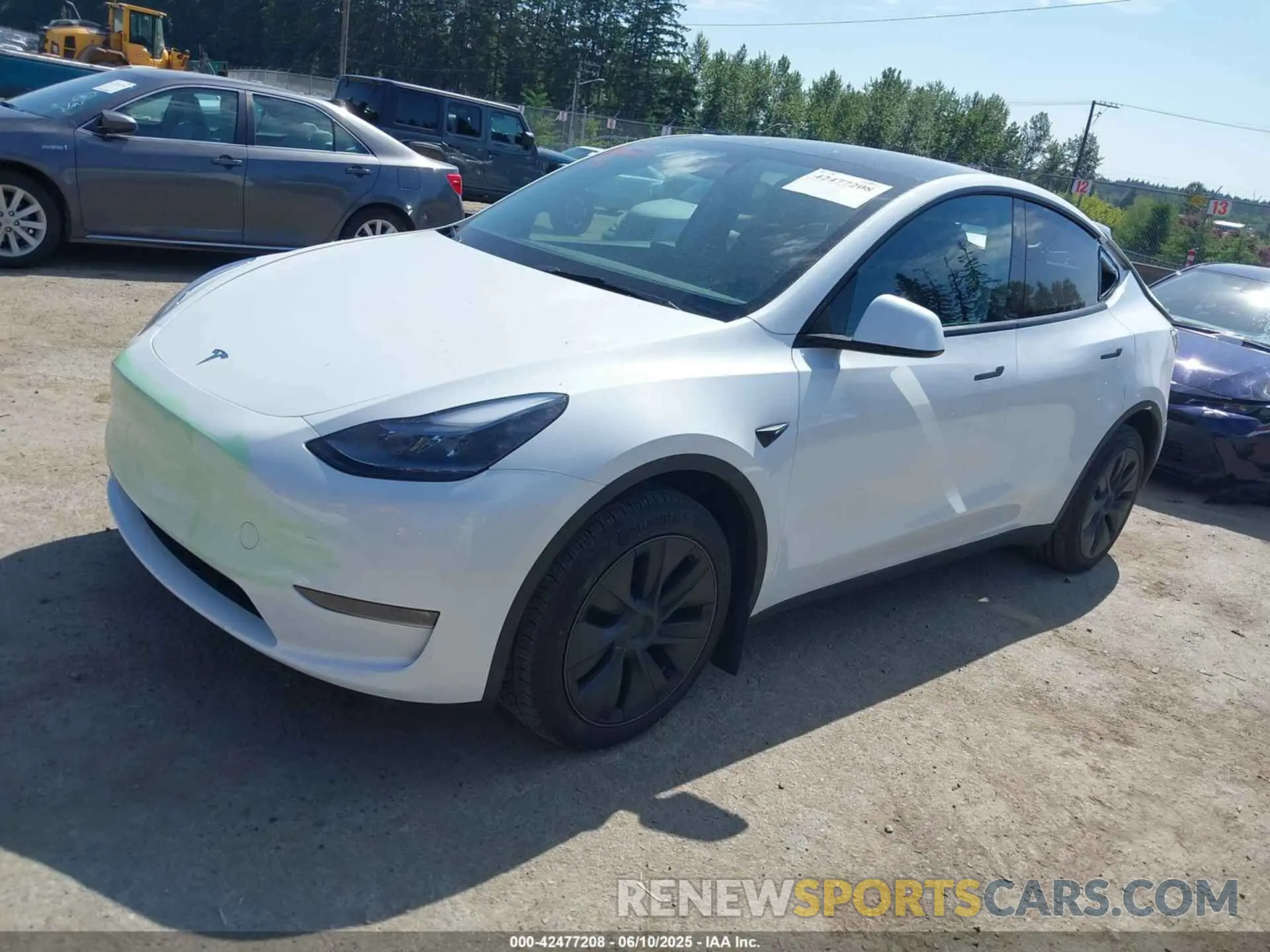 2 Photograph of a damaged car 7SAYGDEE3RF166962 TESLA MODEL Y 2024