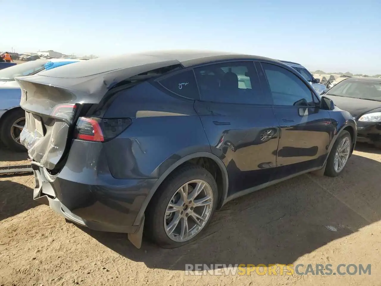 3 Photograph of a damaged car 7SAYGDEE3RF991013 TESLA MODEL Y 2024