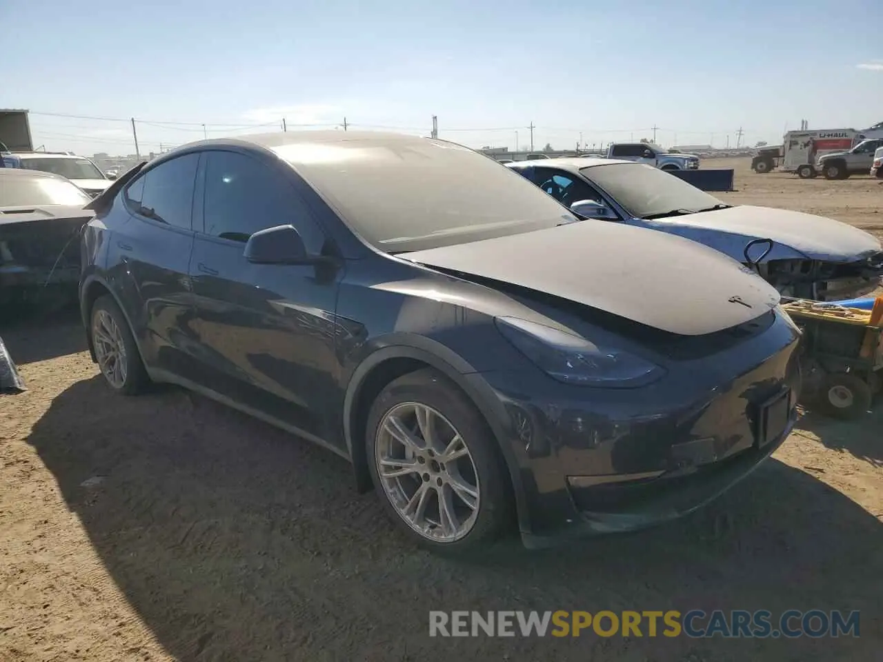 4 Photograph of a damaged car 7SAYGDEE3RF991013 TESLA MODEL Y 2024
