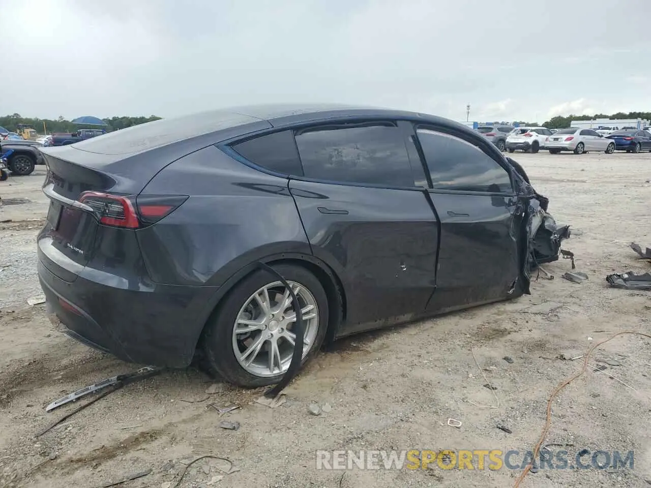 3 Photograph of a damaged car 7SAYGDEE3RF993215 TESLA MODEL Y 2024