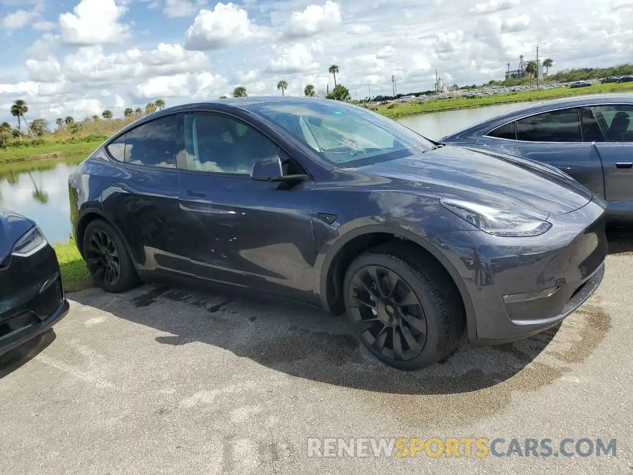 4 Photograph of a damaged car 7SAYGDEE4RA234411 TESLA MODEL Y 2024
