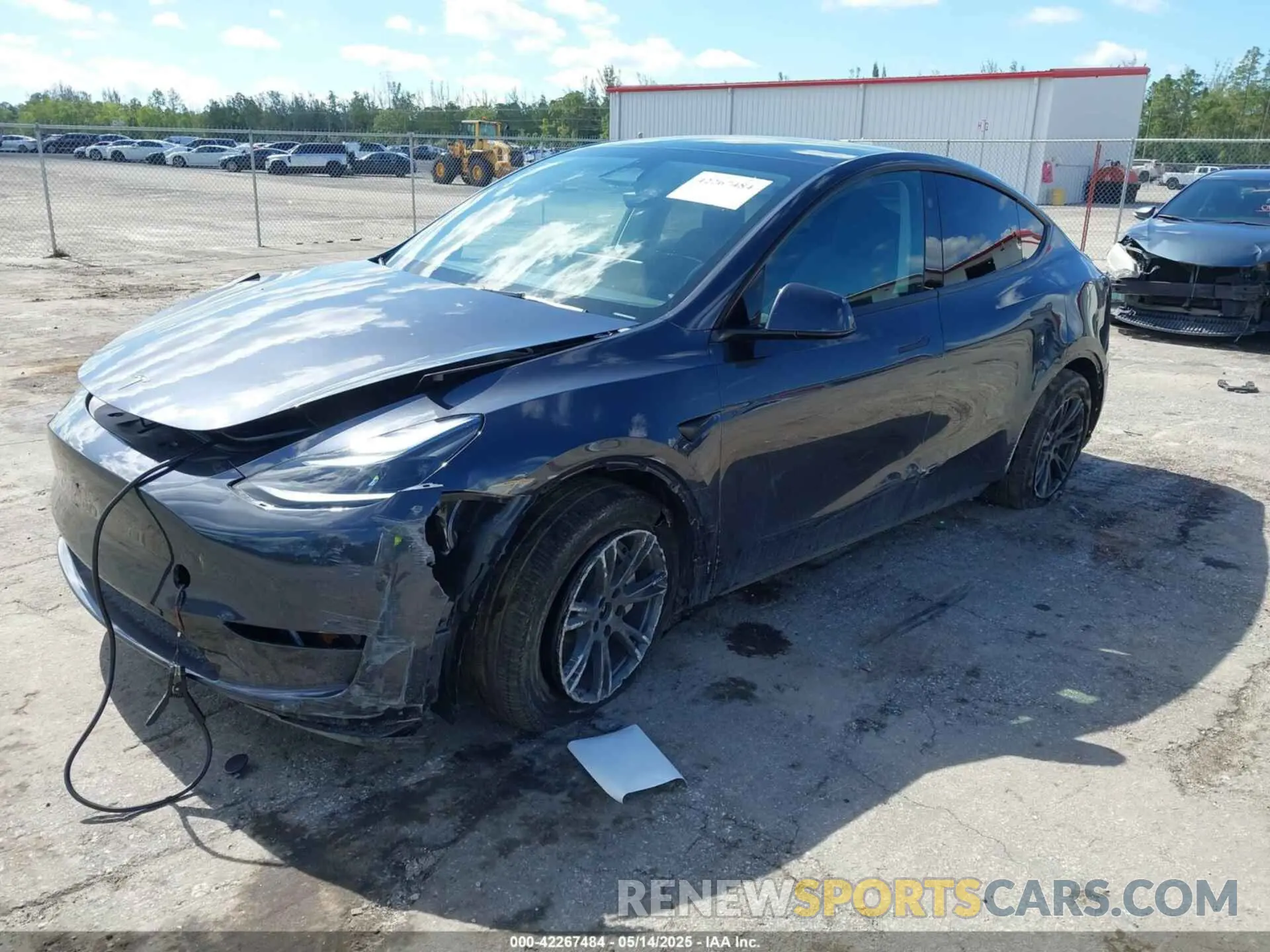 6 Photograph of a damaged car 7SAYGDEE4RA322410 TESLA MODEL Y 2024