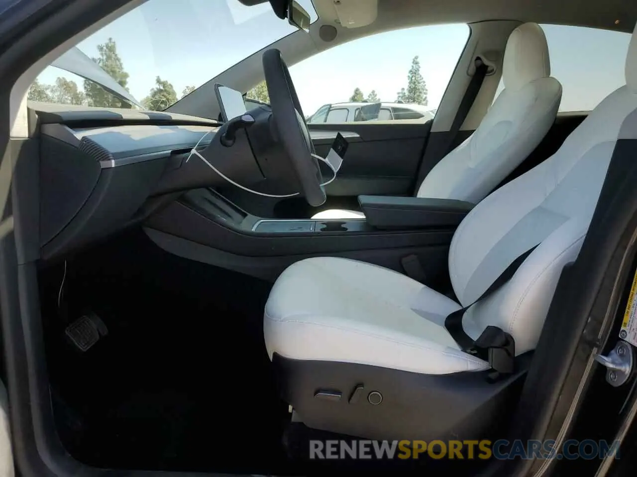 7 Photograph of a damaged car 7SAYGDEE4RF004435 TESLA MODEL Y 2024