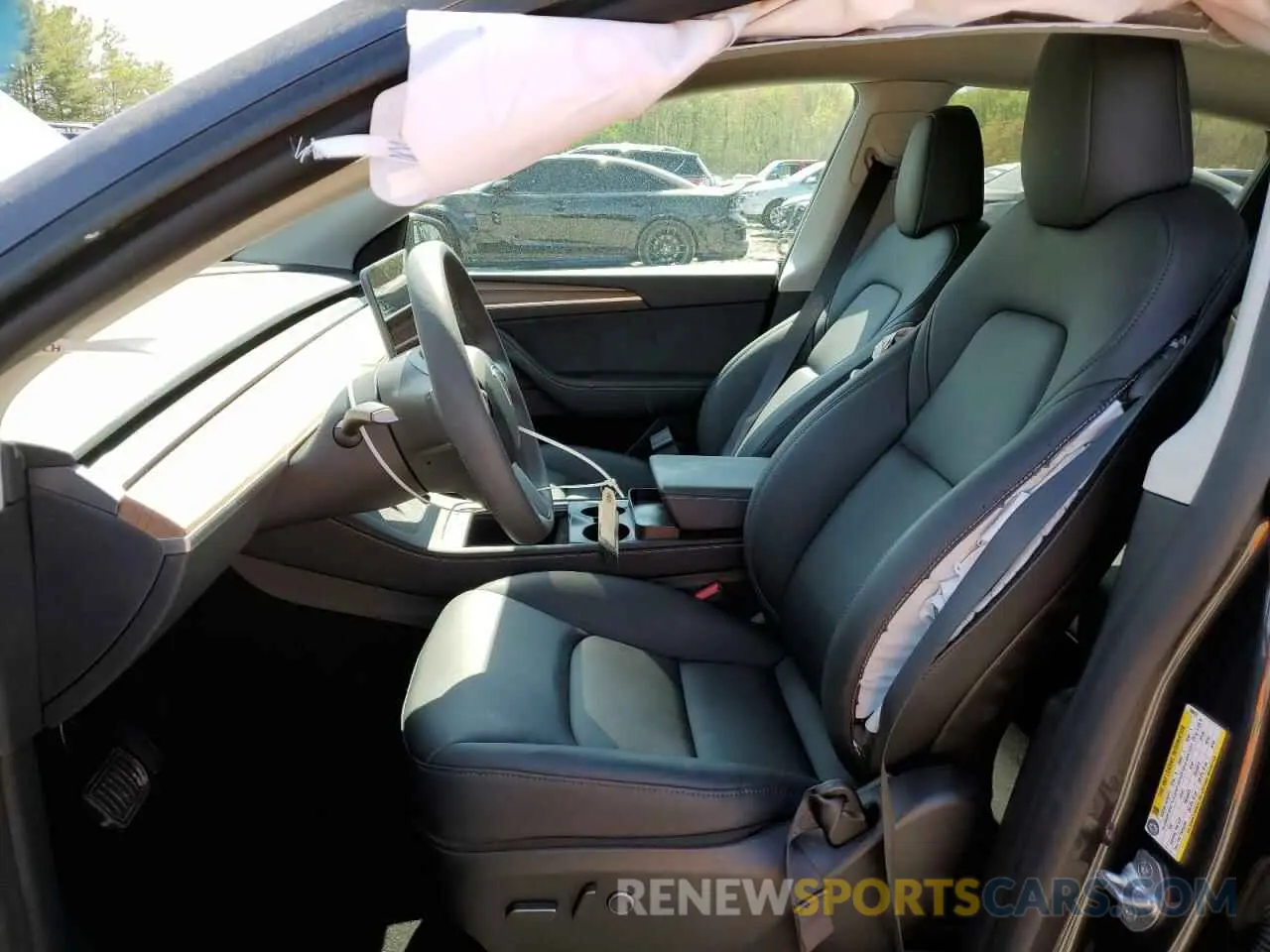 7 Photograph of a damaged car 7SAYGDEE4RF990274 TESLA MODEL Y 2024