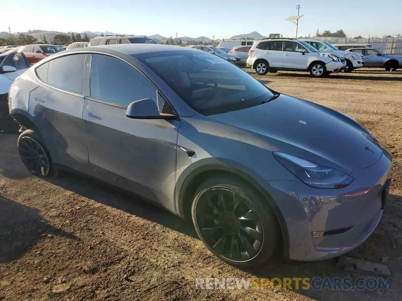 4 Photograph of a damaged car 7SAYGDEE4RF990565 TESLA MODEL Y 2024