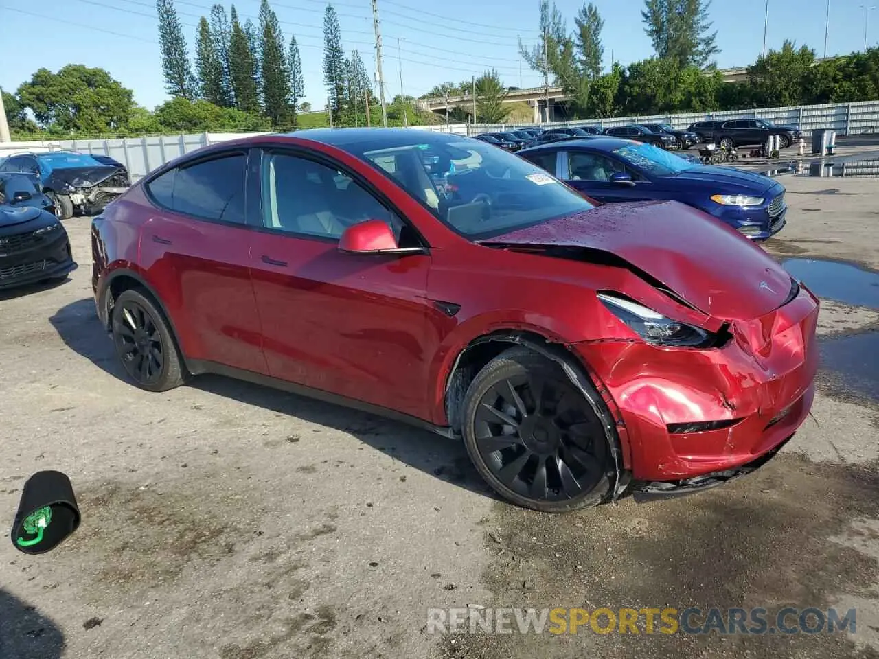 4 Photograph of a damaged car 7SAYGDEE5RA222011 TESLA MODEL Y 2024