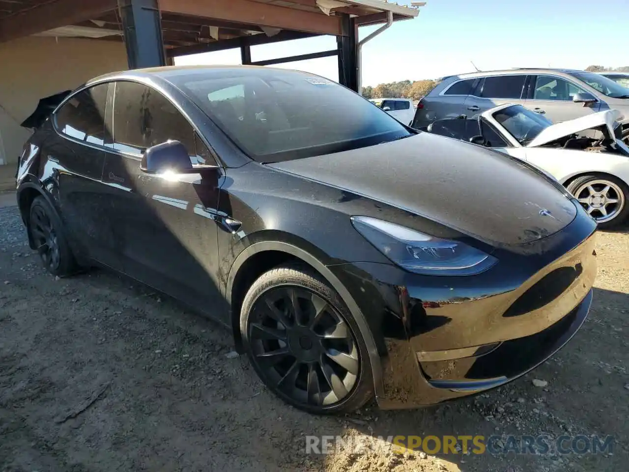 4 Photograph of a damaged car 7SAYGDEE5RA270012 TESLA MODEL Y 2024