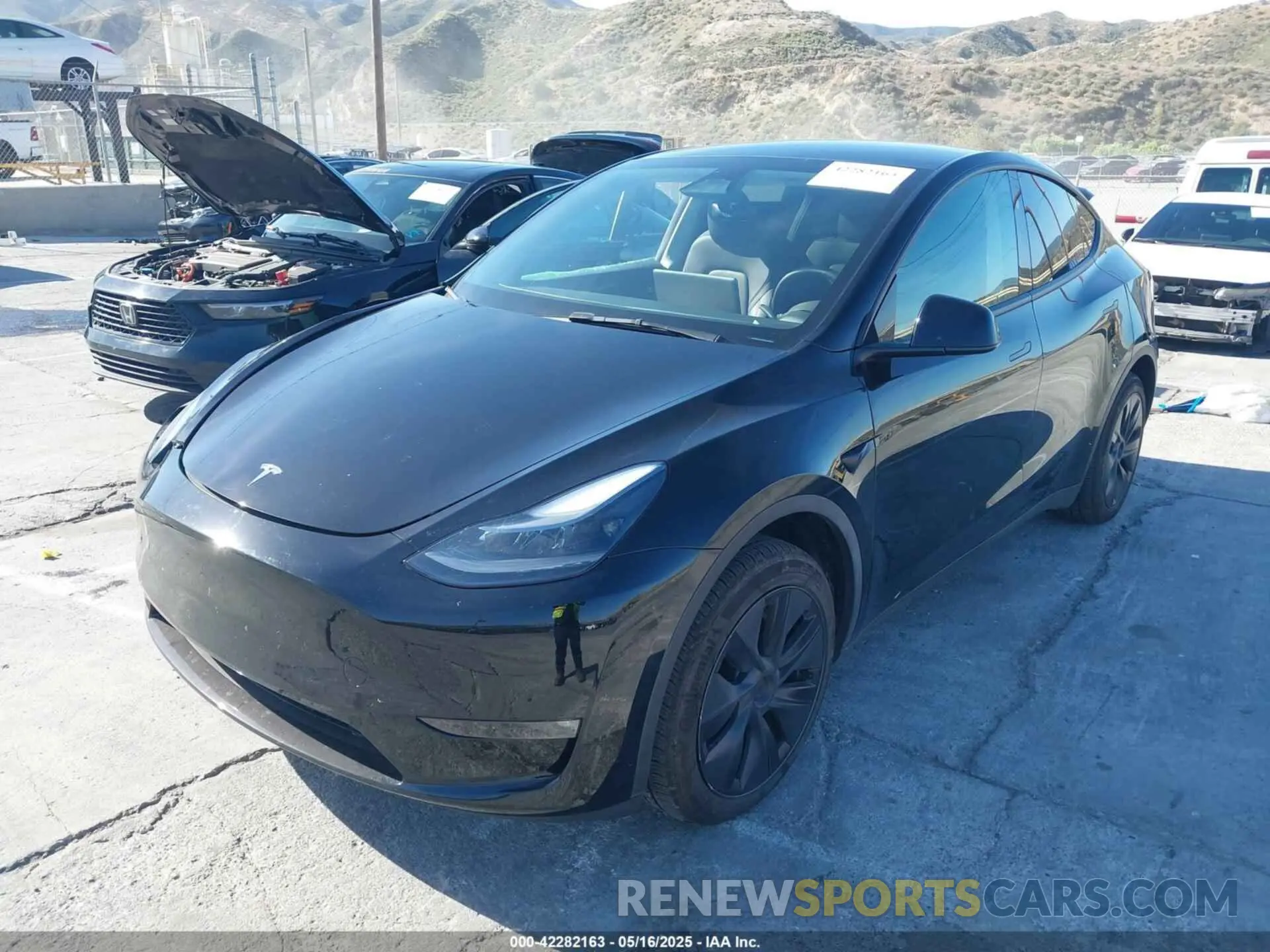 2 Photograph of a damaged car 7SAYGDEE5RF115074 TESLA MODEL Y 2024