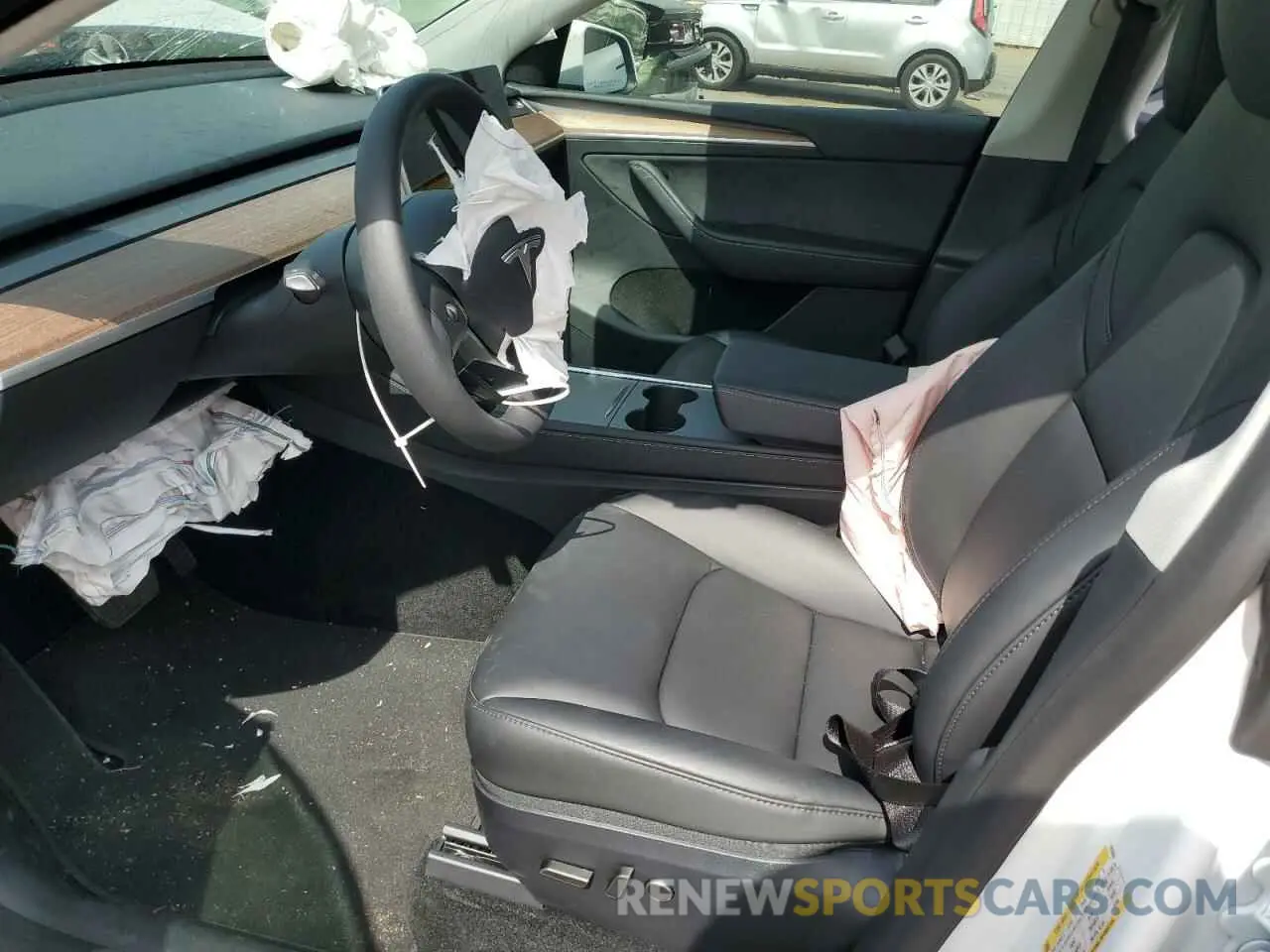 7 Photograph of a damaged car 7SAYGDEE5RF131663 TESLA MODEL Y 2024