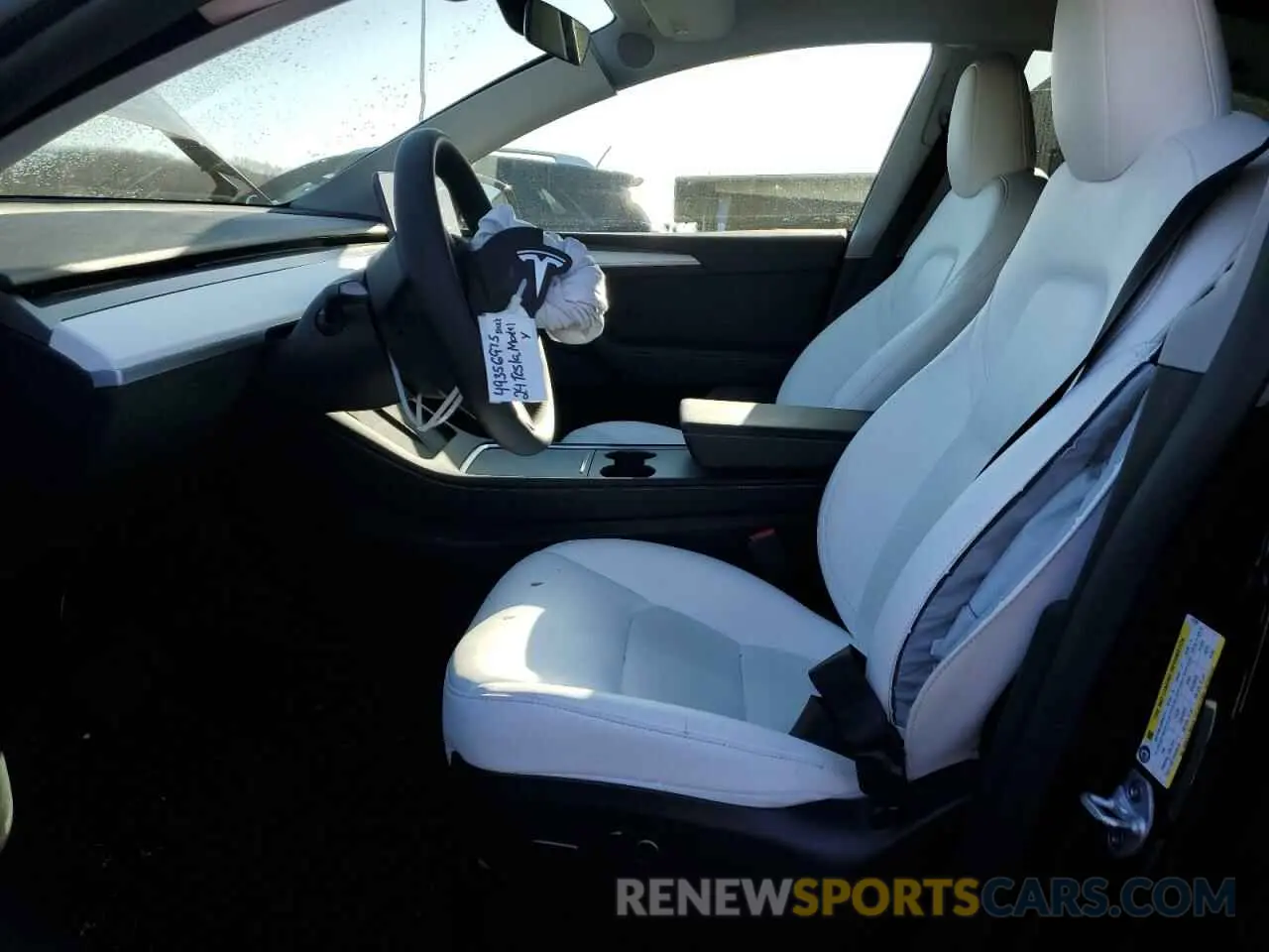 7 Photograph of a damaged car 7SAYGDEE5RF157597 TESLA MODEL Y 2024