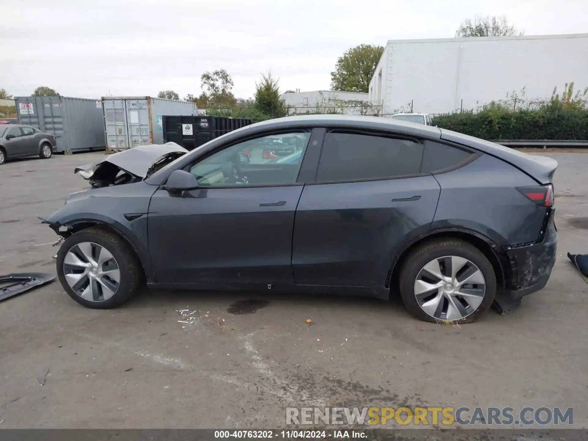 14 Photograph of a damaged car 7SAYGDEE6RA247824 TESLA MODEL Y 2024