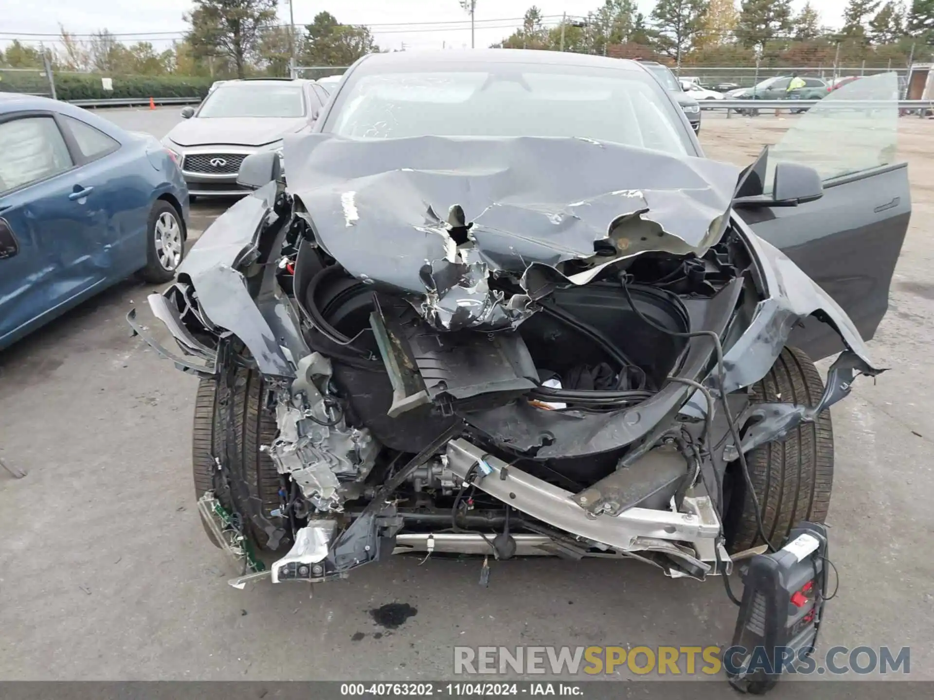 6 Photograph of a damaged car 7SAYGDEE6RA247824 TESLA MODEL Y 2024