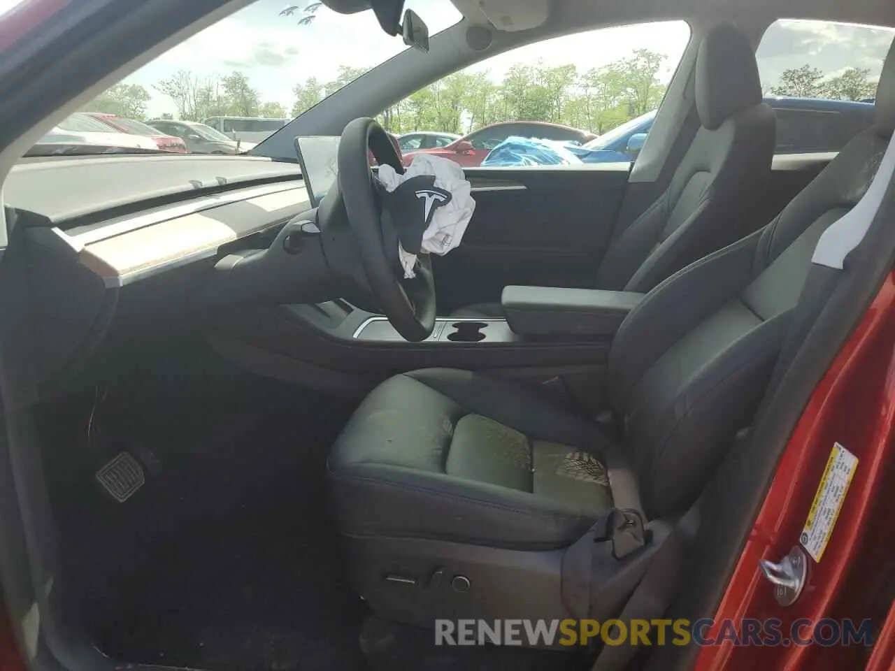 7 Photograph of a damaged car 7SAYGDEE6RA261108 TESLA MODEL Y 2024
