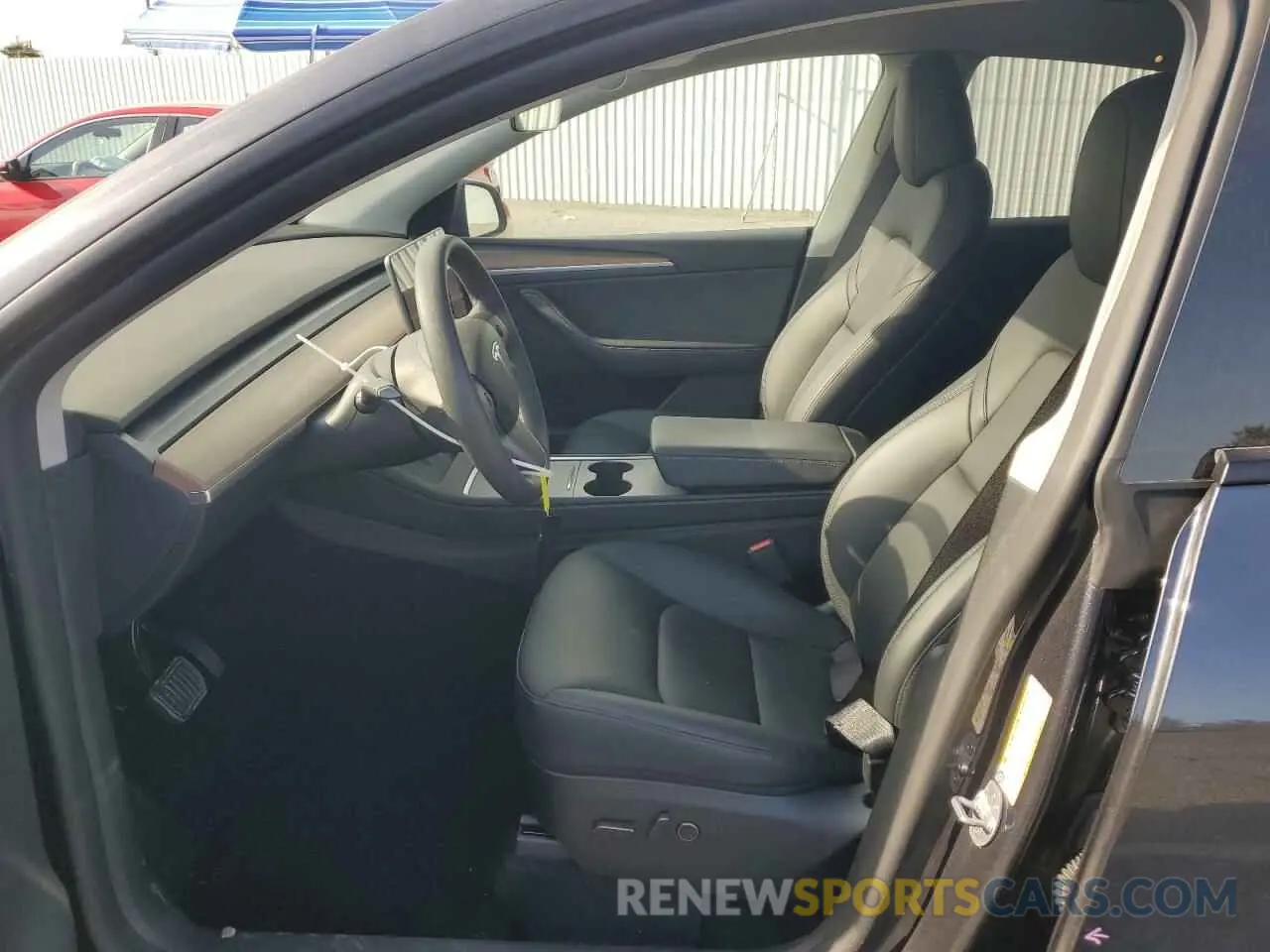 7 Photograph of a damaged car 7SAYGDEE6RA261223 TESLA MODEL Y 2024