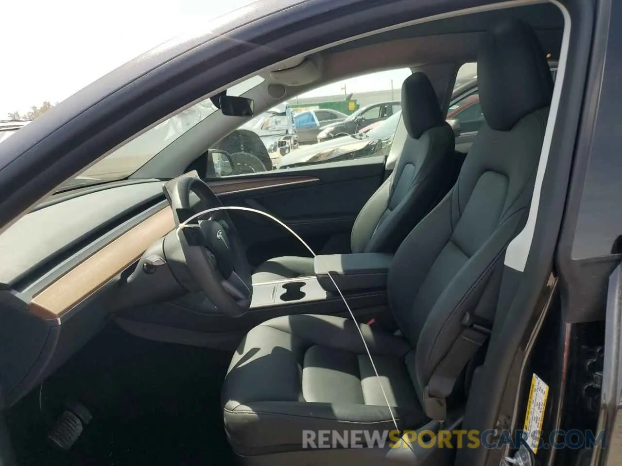 7 Photograph of a damaged car 7SAYGDEE6RF074728 TESLA MODEL Y 2024