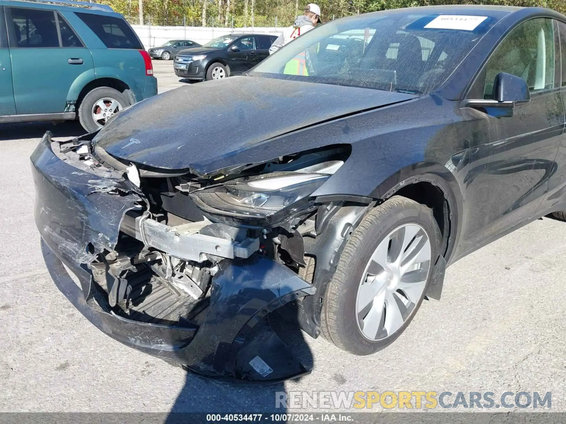 6 Photograph of a damaged car 7SAYGDEE6RF088130 TESLA MODEL Y 2024