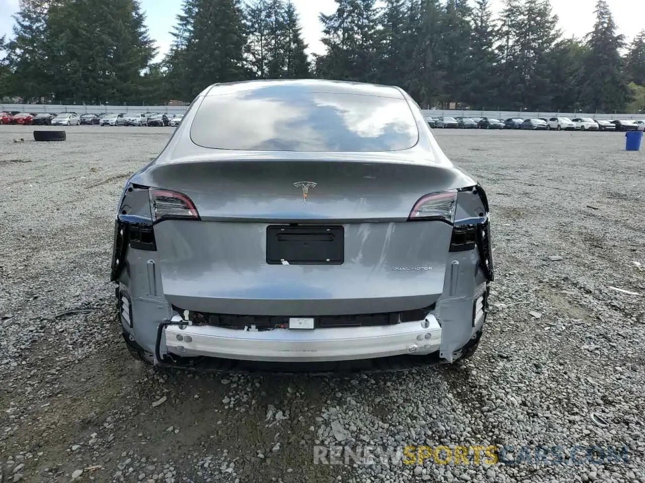 6 Photograph of a damaged car 7SAYGDEE6RF104018 TESLA MODEL Y 2024