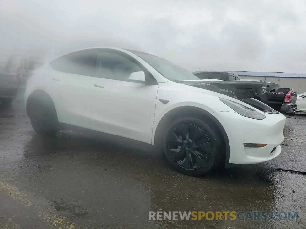 4 Photograph of a damaged car 7SAYGDEE6RF162372 TESLA MODEL Y 2024