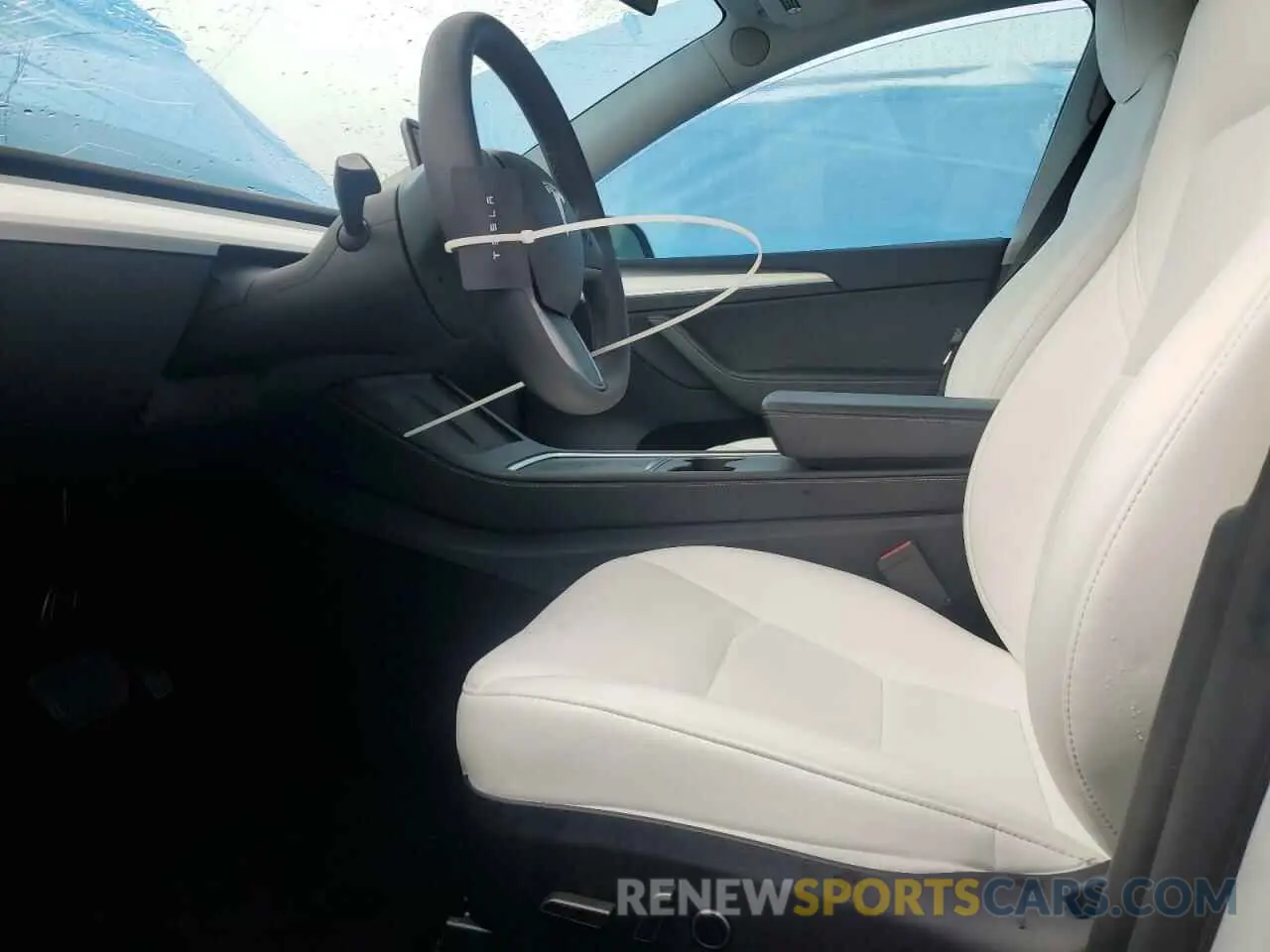 7 Photograph of a damaged car 7SAYGDEE6RF162372 TESLA MODEL Y 2024