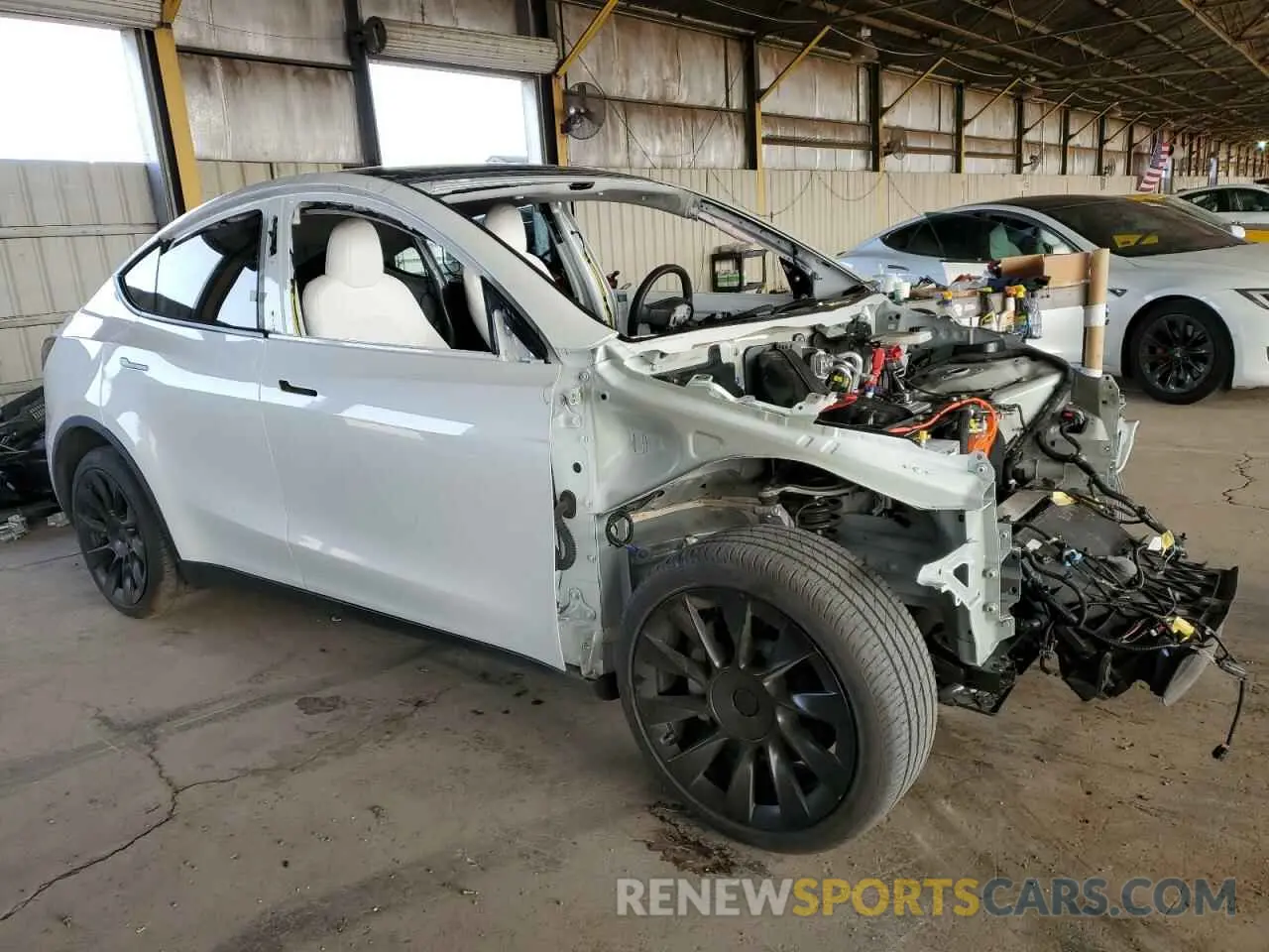 4 Photograph of a damaged car 7SAYGDEE7RA217991 TESLA MODEL Y 2024