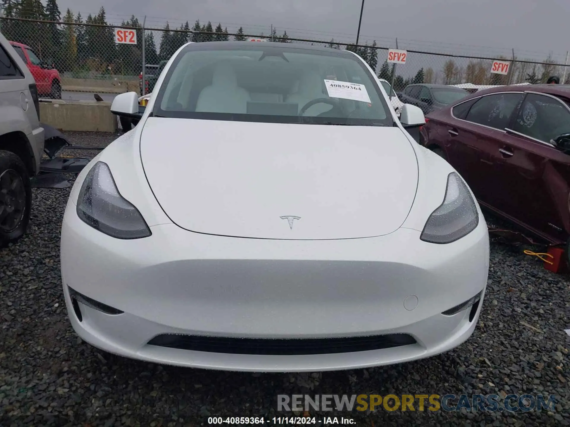 13 Photograph of a damaged car 7SAYGDEE7RF083700 TESLA MODEL Y 2024
