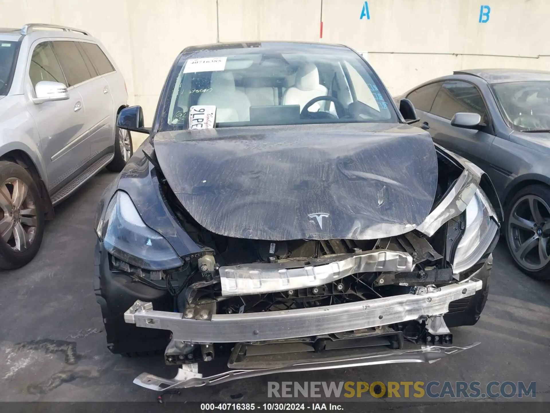 13 Photograph of a damaged car 7SAYGDEE8RA231477 TESLA MODEL Y 2024