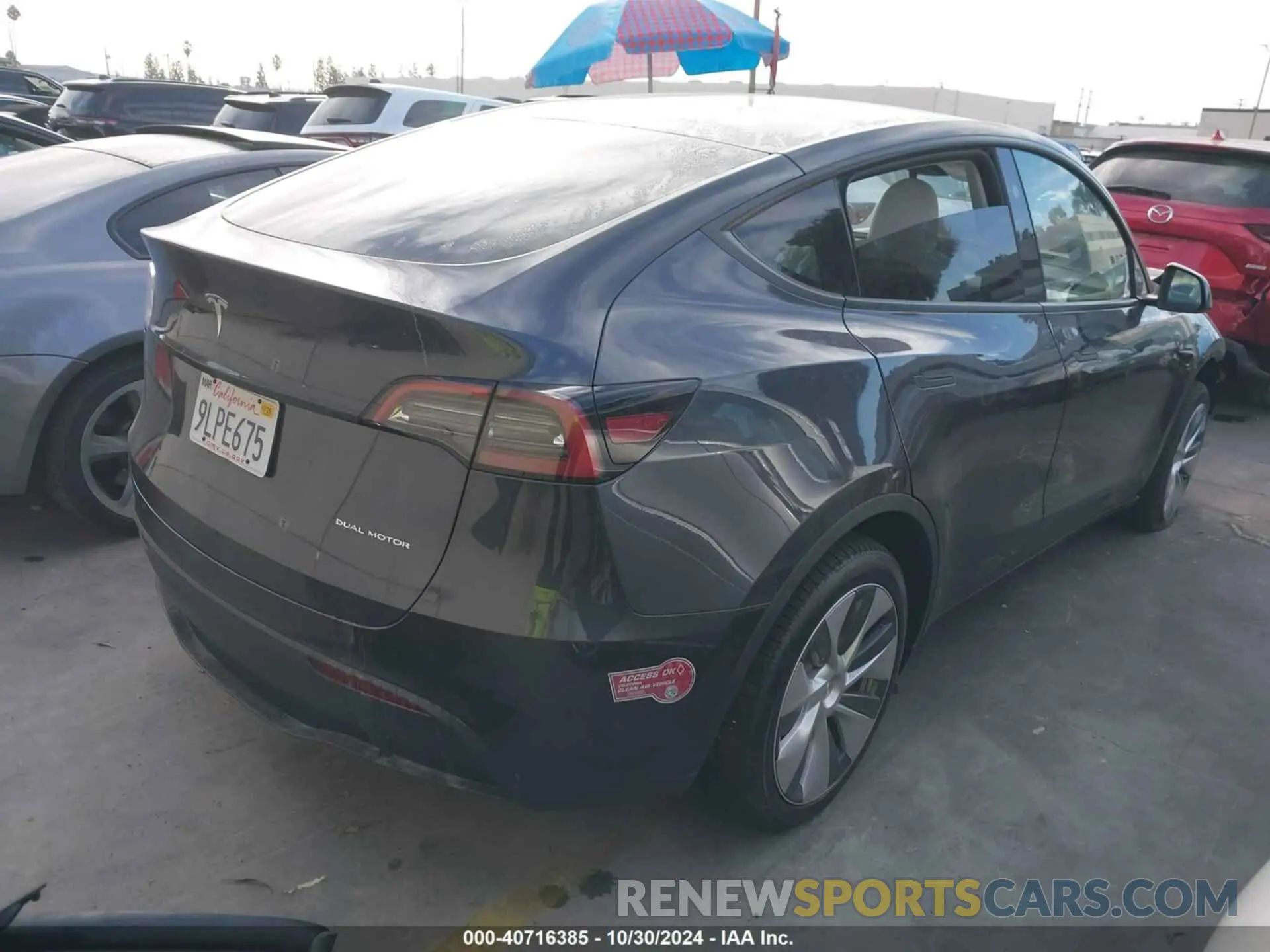 4 Photograph of a damaged car 7SAYGDEE8RA231477 TESLA MODEL Y 2024
