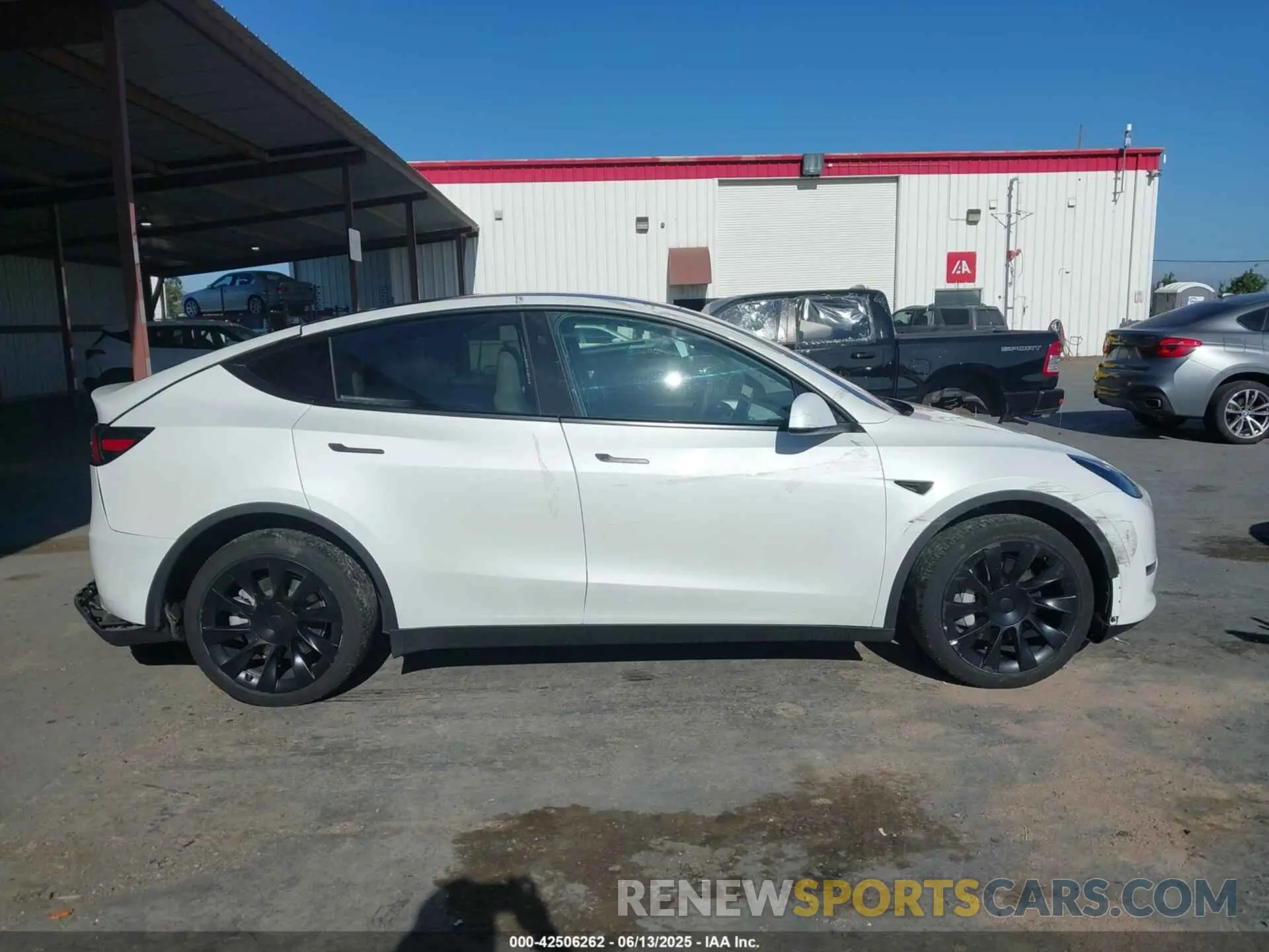 13 Photograph of a damaged car 7SAYGDEE8RF983795 TESLA MODEL Y 2024