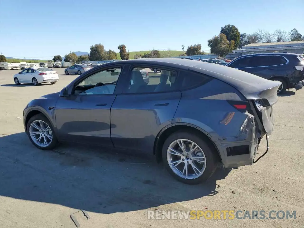 2 Photograph of a damaged car 7SAYGDEE9RA215563 TESLA MODEL Y 2024