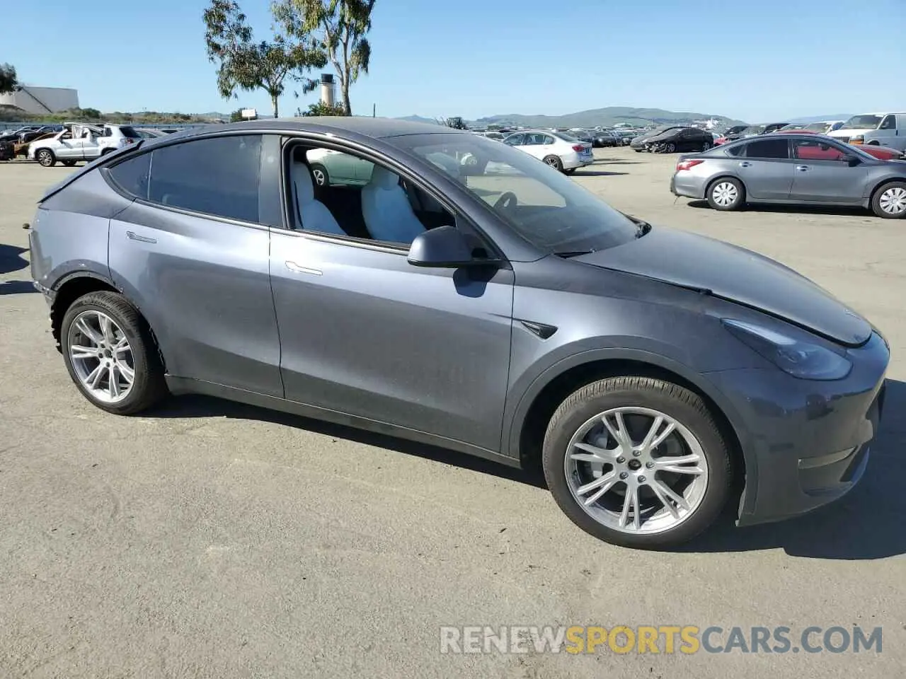 4 Photograph of a damaged car 7SAYGDEE9RA215563 TESLA MODEL Y 2024
