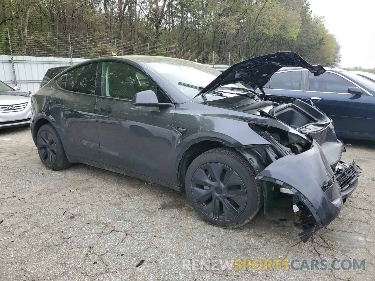 4 Photograph of a damaged car 7SAYGDEE9RA293776 TESLA MODEL Y 2024