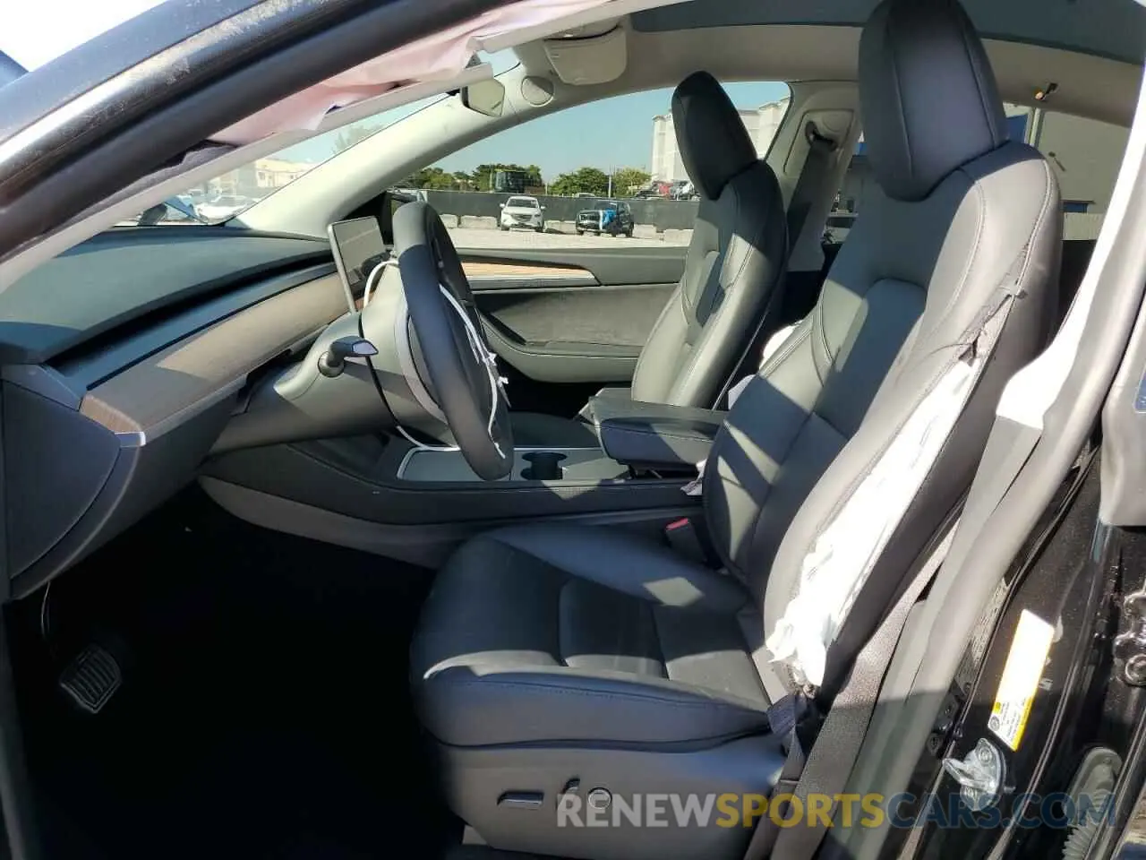 7 Photograph of a damaged car 7SAYGDEE9RA303397 TESLA MODEL Y 2024
